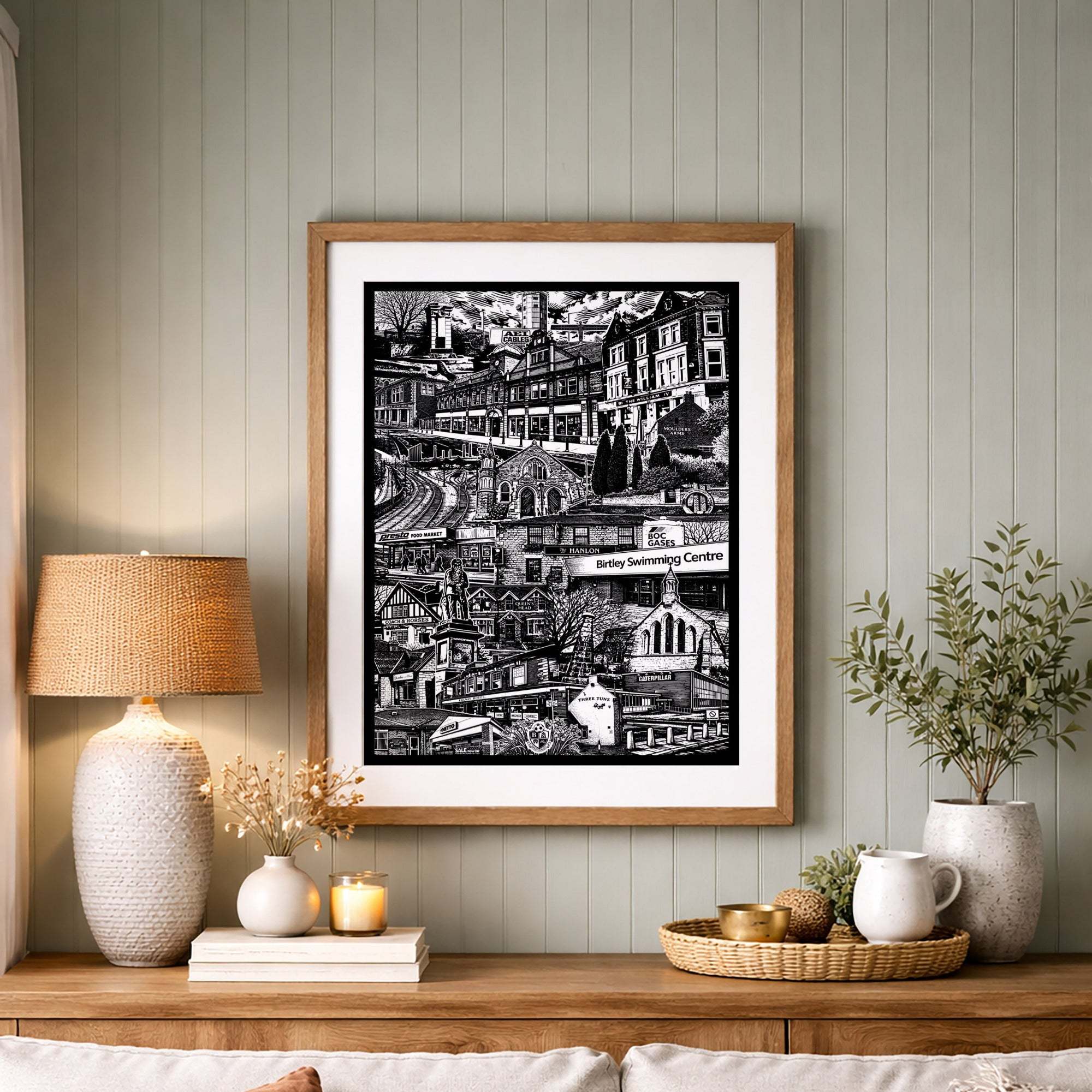 Living room with a sofa, lamp, and framed artwork on a wooden shelf.