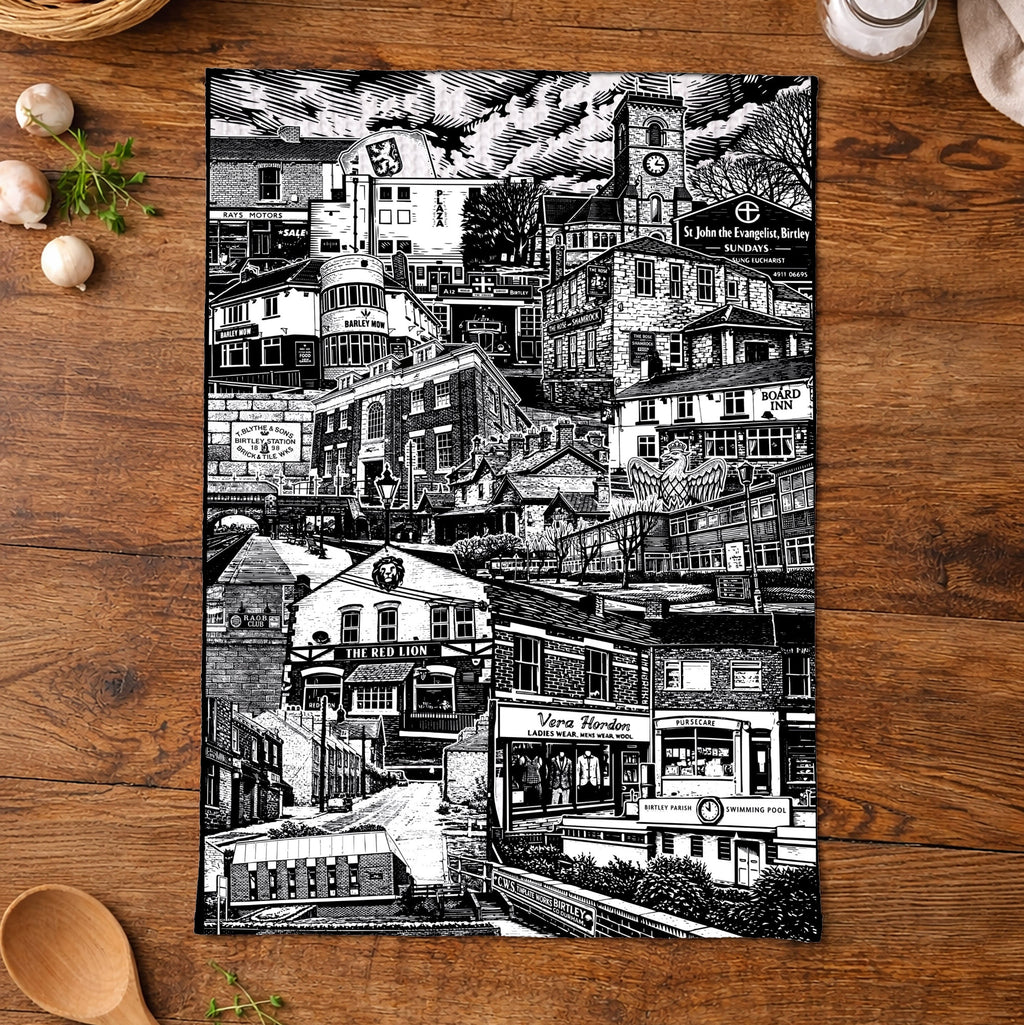 Black and white collage of buildings on a wooden surface with kitchen items.