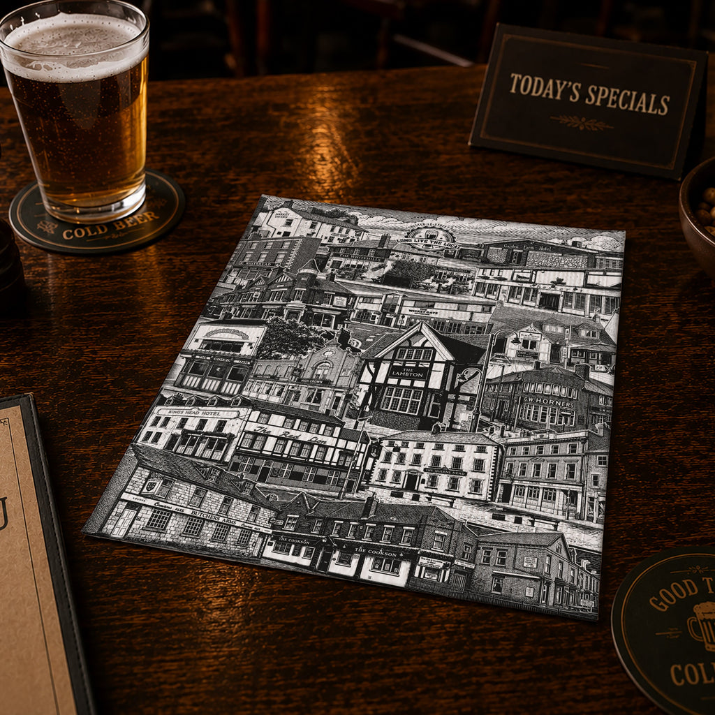 Two glasses of beer on a wooden table with a menu and a map of a town.