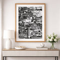 Framed black and white artwork on a wall above a console table with decorative items.