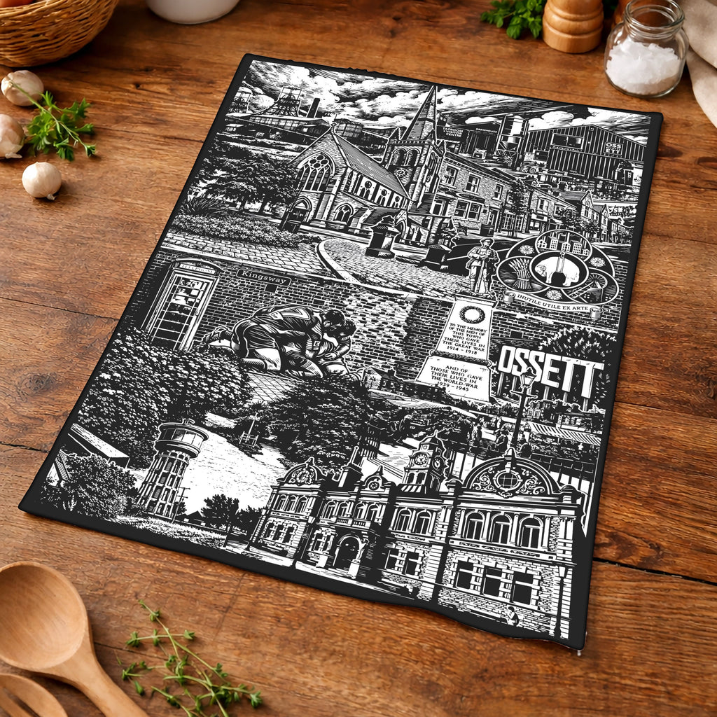Black and white printed mat on a wooden surface with kitchen items around