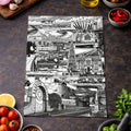 Black and white cityscape illustration on a dark surface with ingredients around