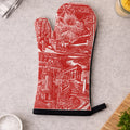Red oven mitt with black interior on a wooden table with food items